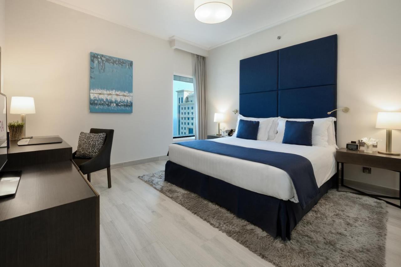 Centara West Bay Hotel & Residences Doha Luaran gambar A bedroom at the hotel